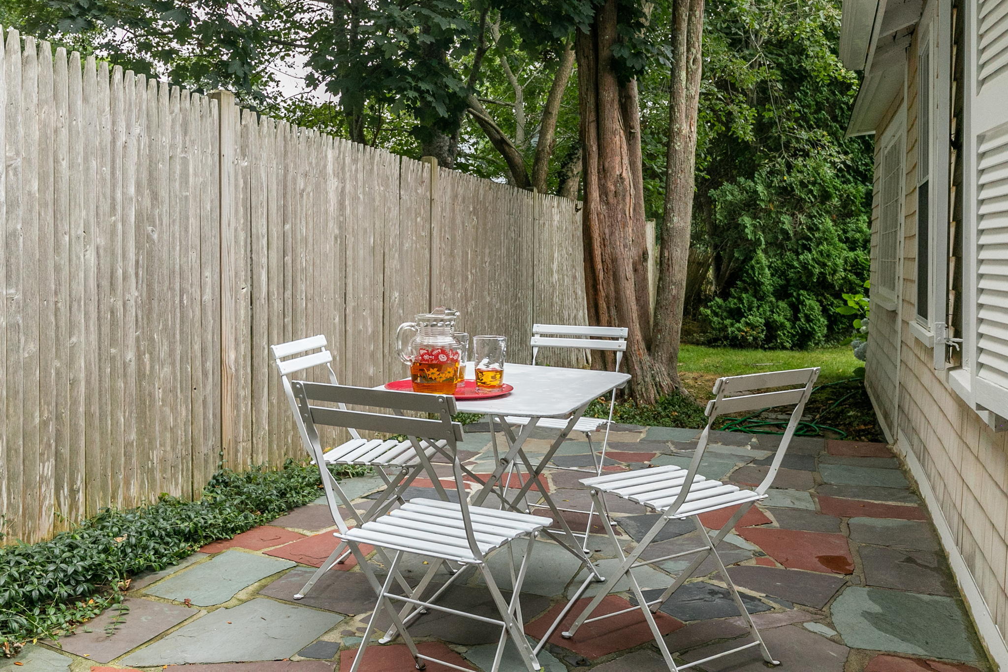 311 Main Street Centerville, MA 02632 - Photo 5 of 45 a outdoor view with a sitting space