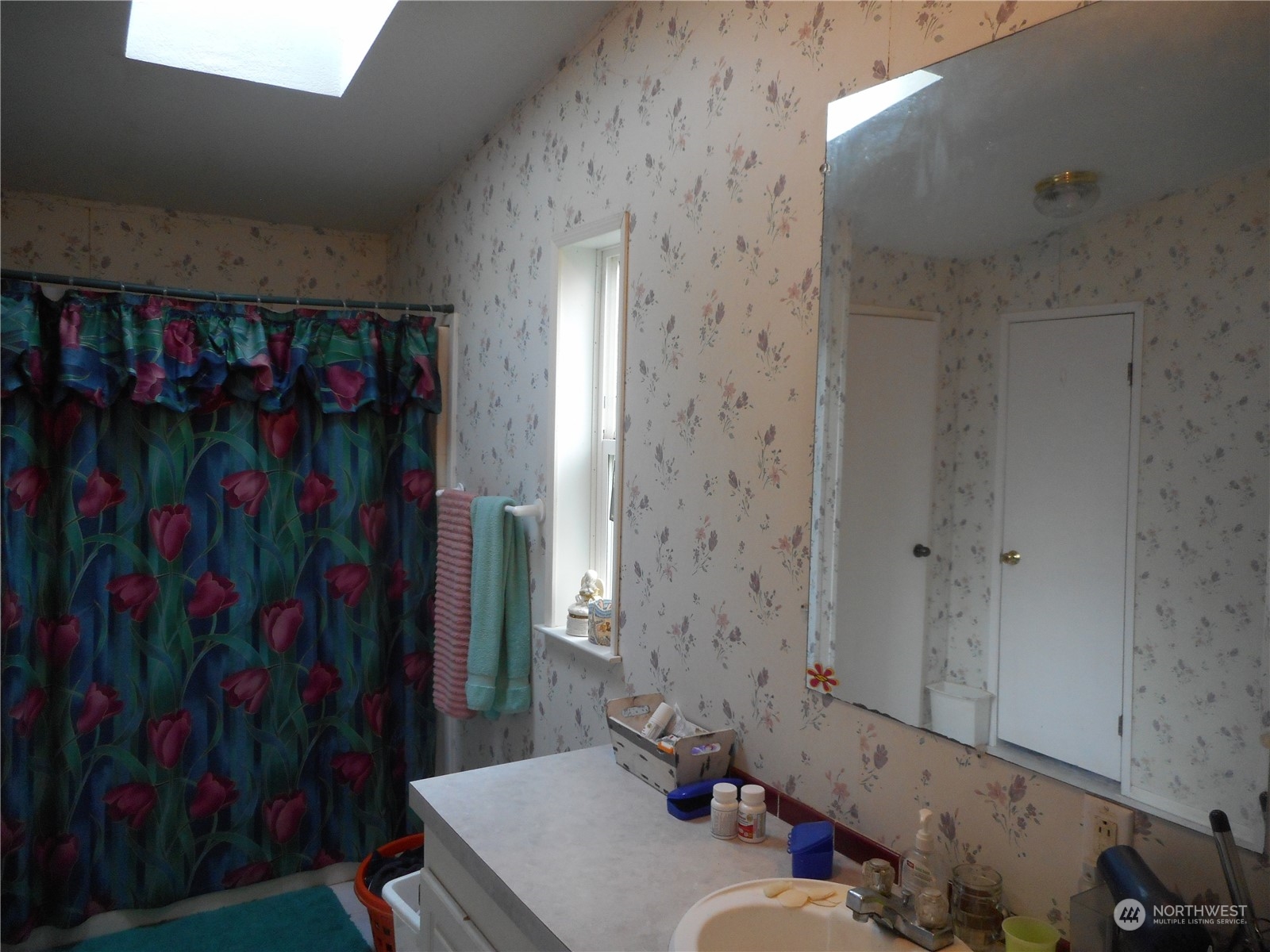 19817 Mac Road Granite Falls, WA 98252 - Photo 11 of 17 a bathroom with a sink and a mirror