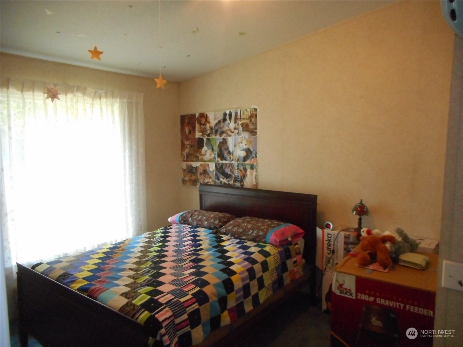 19817 Mac Road Granite Falls, WA 98252 - Photo 13 of 17 a bedroom with a bed and a window