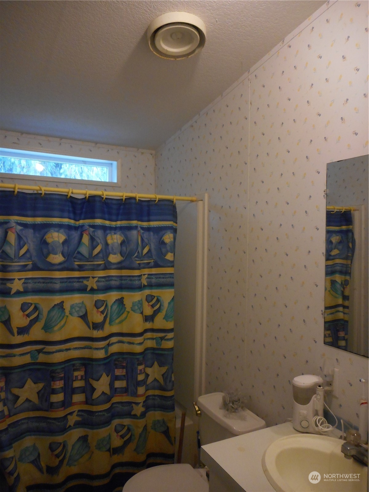 19817 Mac Road Granite Falls, WA 98252 - Photo 15 of 17 a bathroom with a sink and a toilet