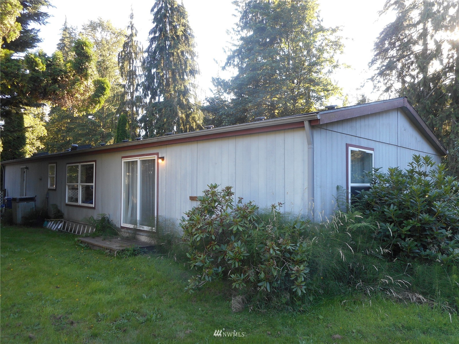 19817 Mac Road Granite Falls, WA 98252 - Photo 16 of 17 a backyard of a house with lots of green space