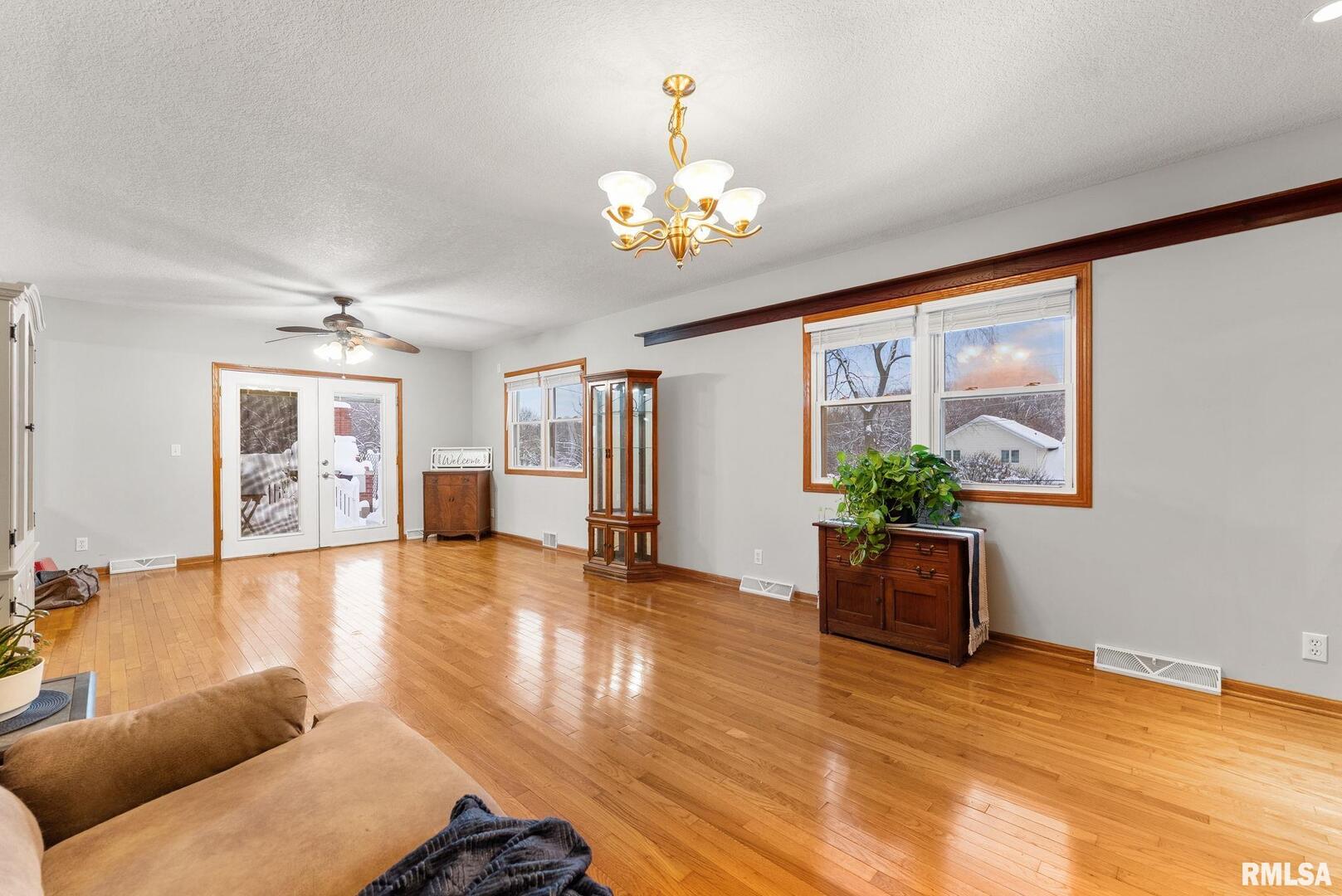 2530 37th Avenue Rock Island, IL 61201 - Photo 11 of 31 a living room with furniture and a large window
