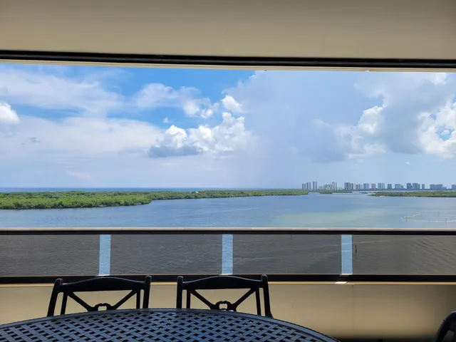 a view of a lake from a balcony