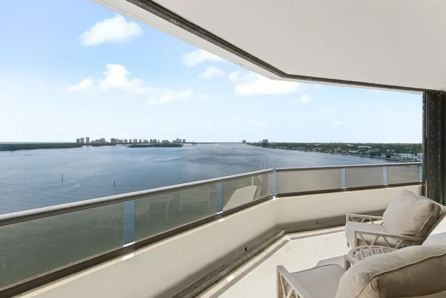 a view of a lake from a balcony