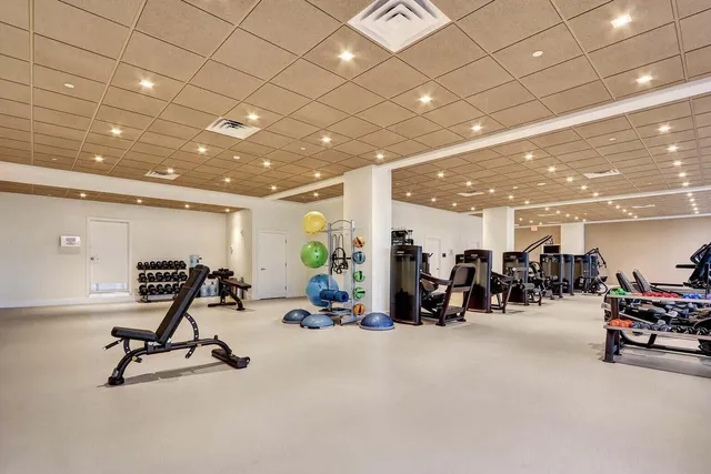 a view of swimming pool with outdoor seating and lake