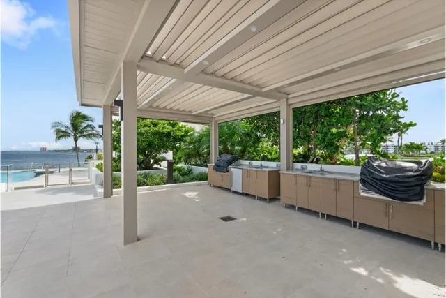 a lobby with a couch and a large window