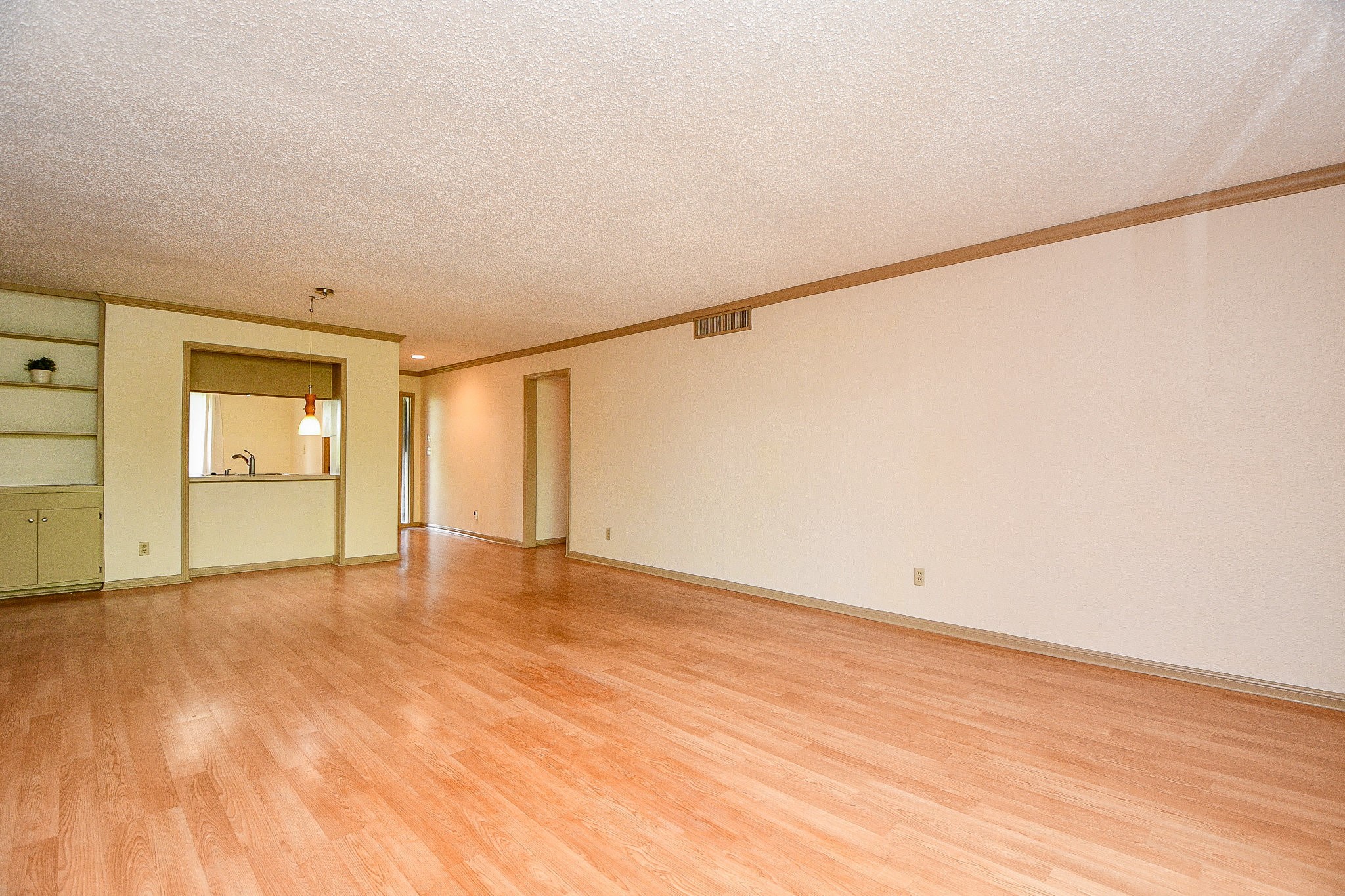 6533 Bayou Glen Road Houston, TX 77057 - Photo 10 of 19 a view of an empty room with wooden floor