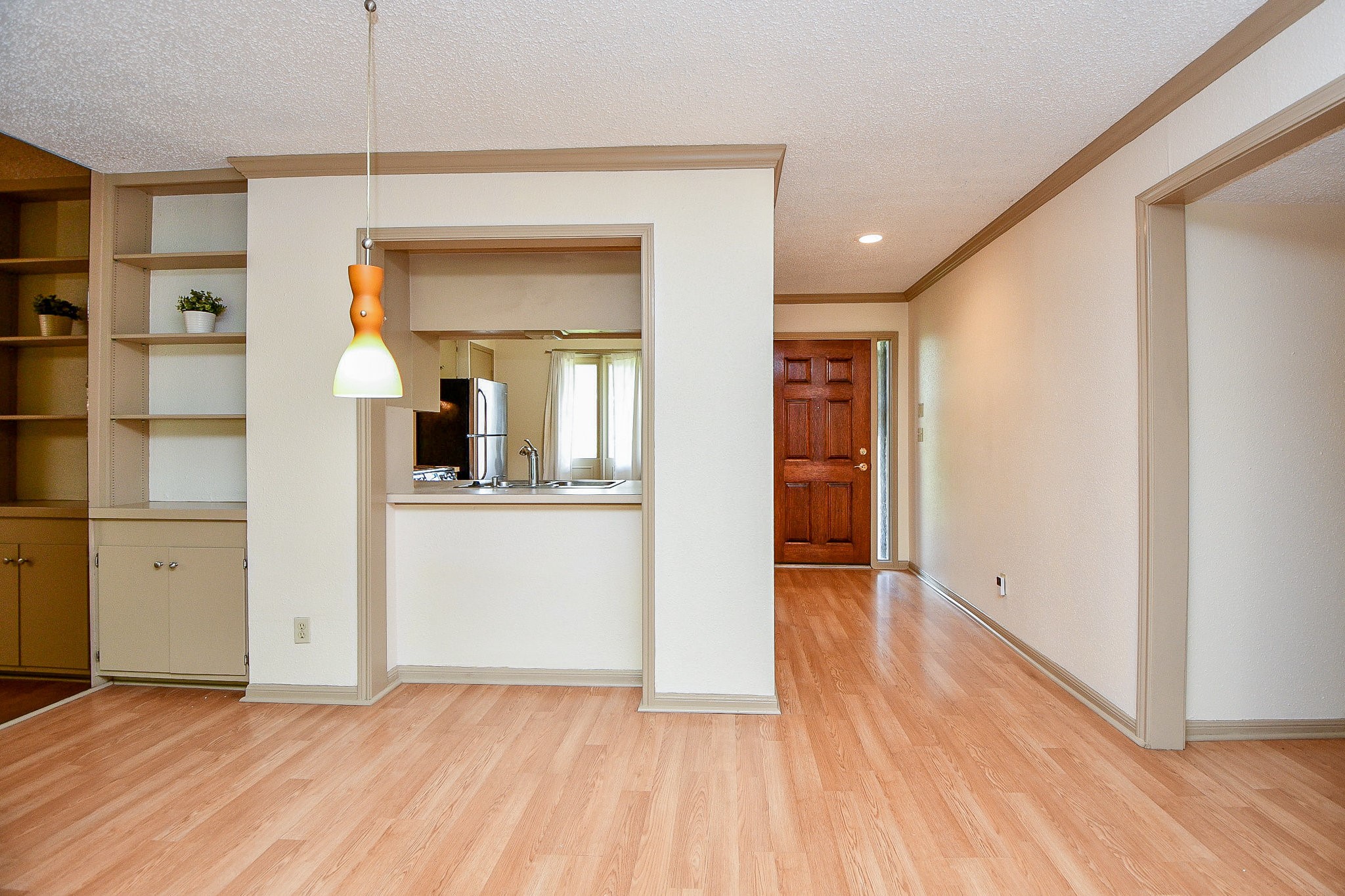 6533 Bayou Glen Road Houston, TX 77057 - Photo 9 of 19 wooden floor in an empty room with a window