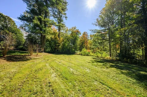 an aerial view of residential house with ocean view