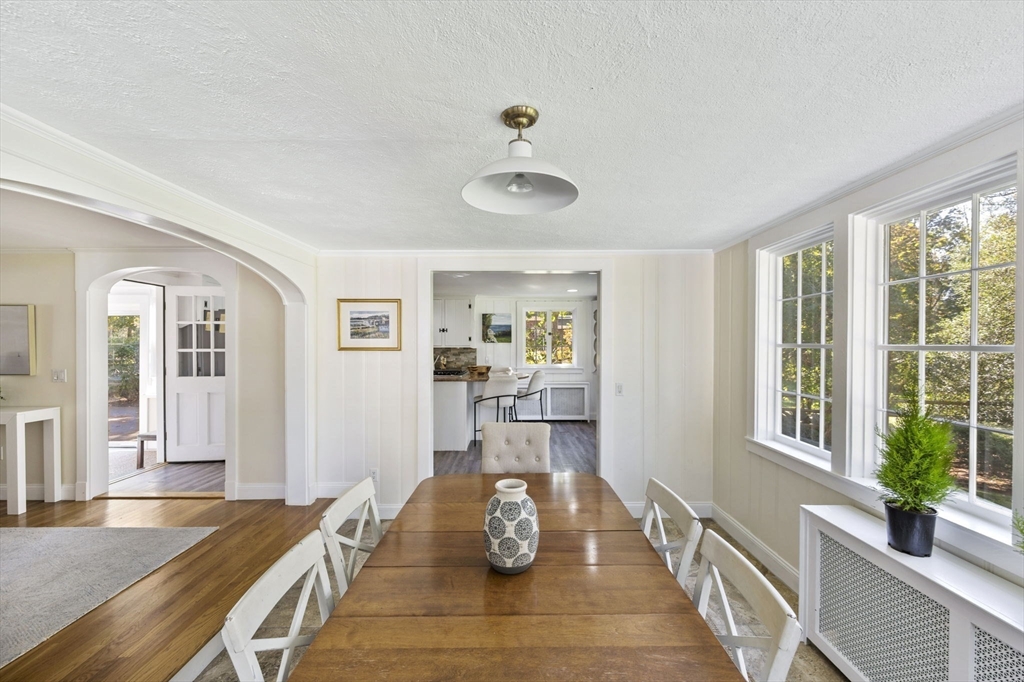216 Whiting Street Hanover, MA 02339 - Photo 6 of 21 a bedroom with furniture and a large window