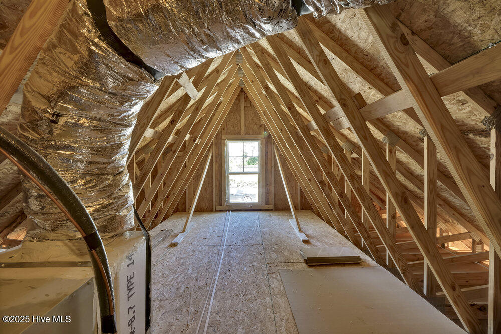 375 Boundary Loop Road Northwest Calabash, NC 28467 - Photo 46 of 56 Floored attic storage