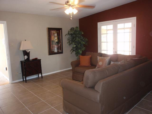 420 East Garfield Street Tempe, AZ 85288 - Photo 2 of 7 a living room with furniture and a window