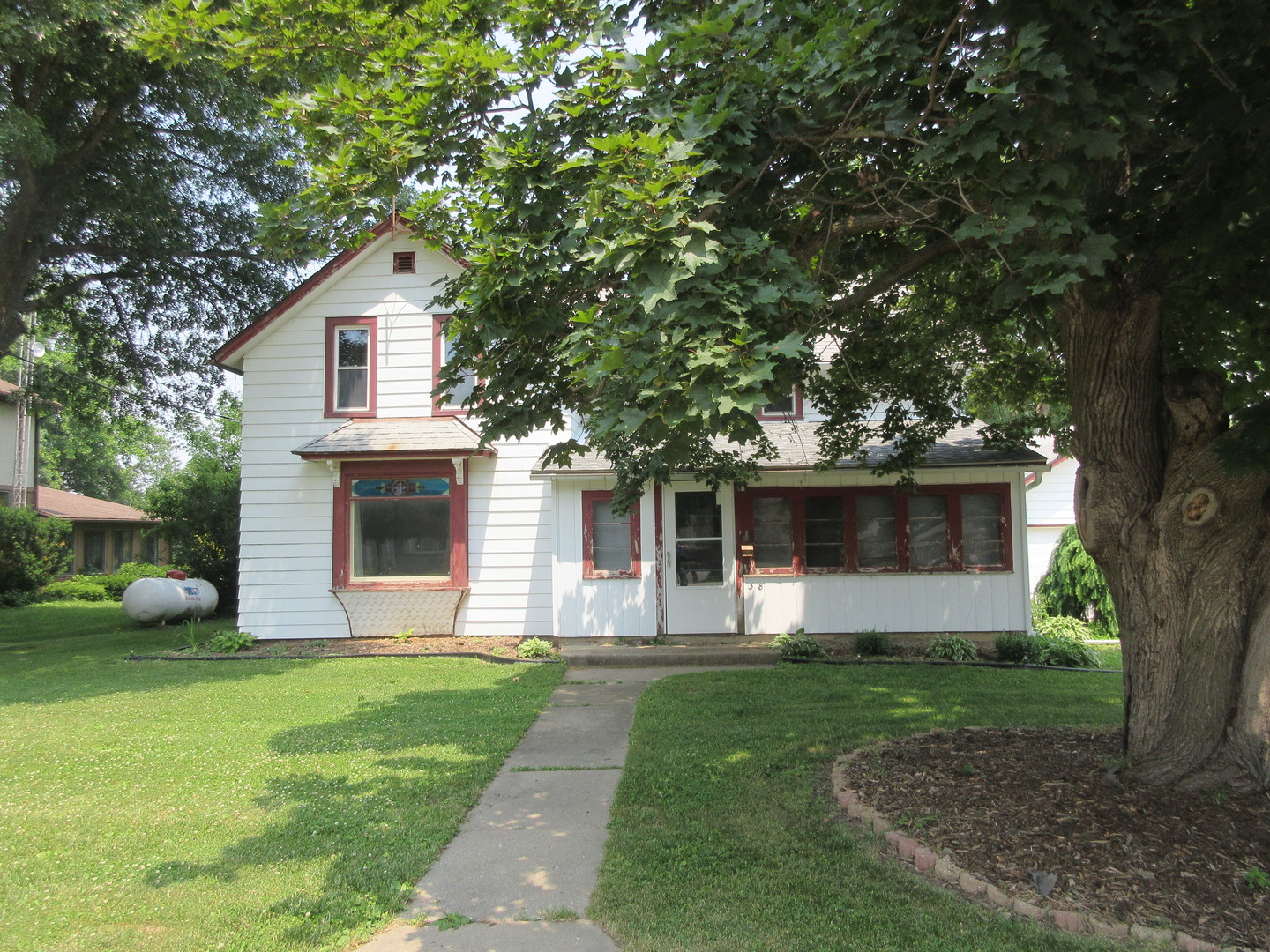 308 West Grove Road Sterling, IL 61081 - Photo 1 of 35 a front view of house with yard and green space