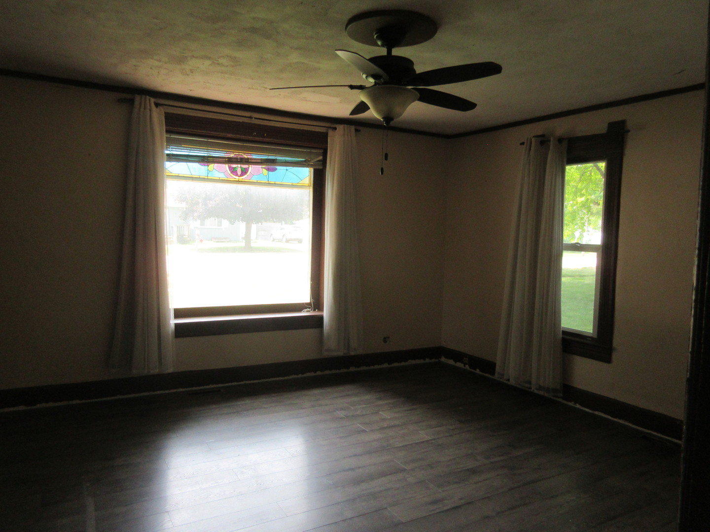 308 West Grove Road Sterling, IL 61081 - Photo 11 of 35 a view of an empty room and a window