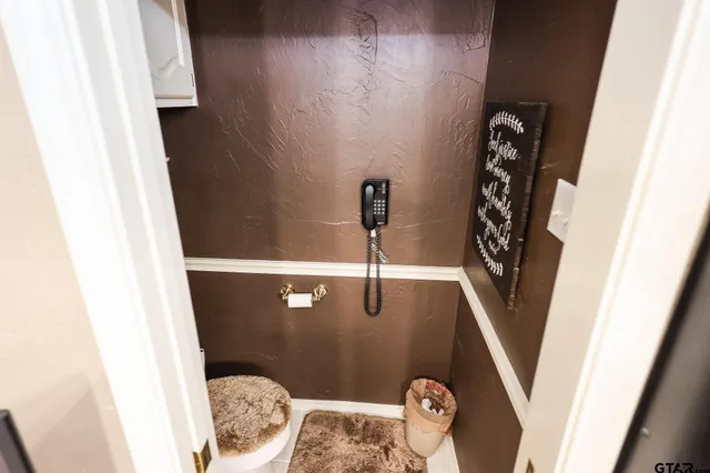a bathroom with a sink double vanity and a mirror