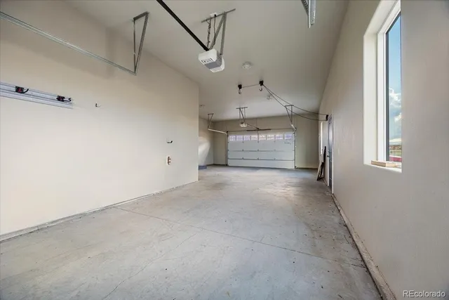 a view of a kitchen with a dishwasher and cabinets