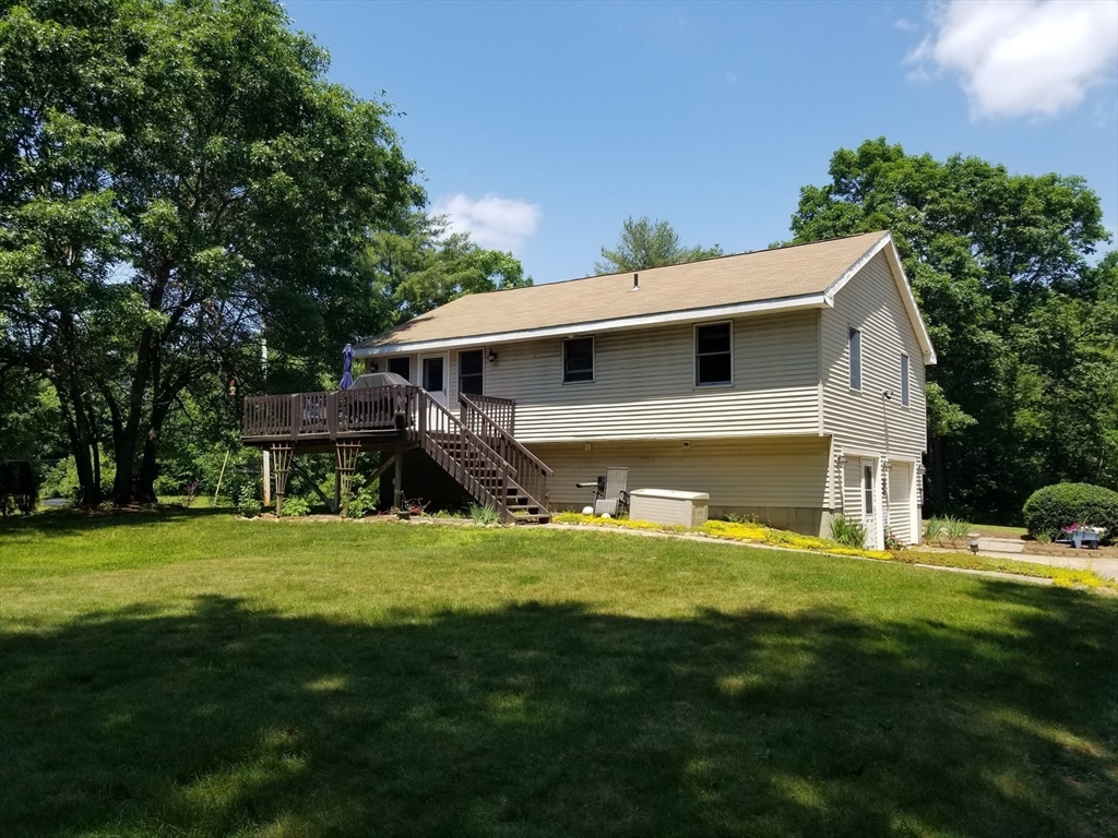 291 Crouch Road Warren, MA 01092 - Photo 3 of 29 a front view of house with yard and green space