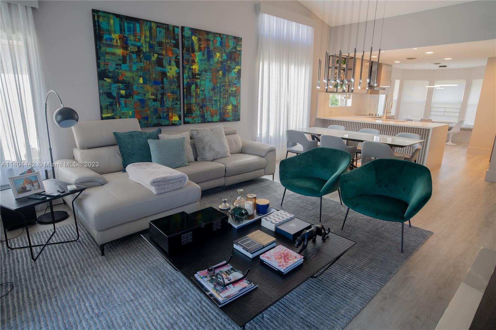 10684 Santa Laguna Drive Boca Raton, FL 33428 - Photo 11 of 39 a living room with furniture and a large window