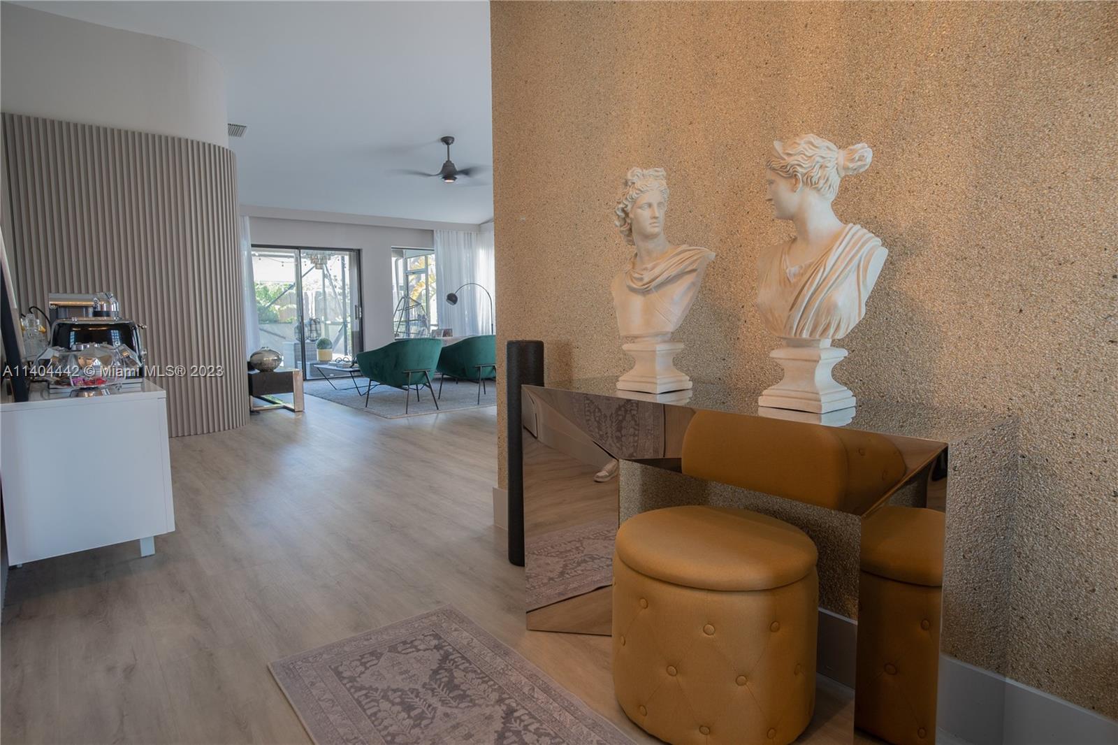 10684 Santa Laguna Drive Boca Raton, FL 33428 - Photo 14 of 39 a living room with furniture and a wooden floor
