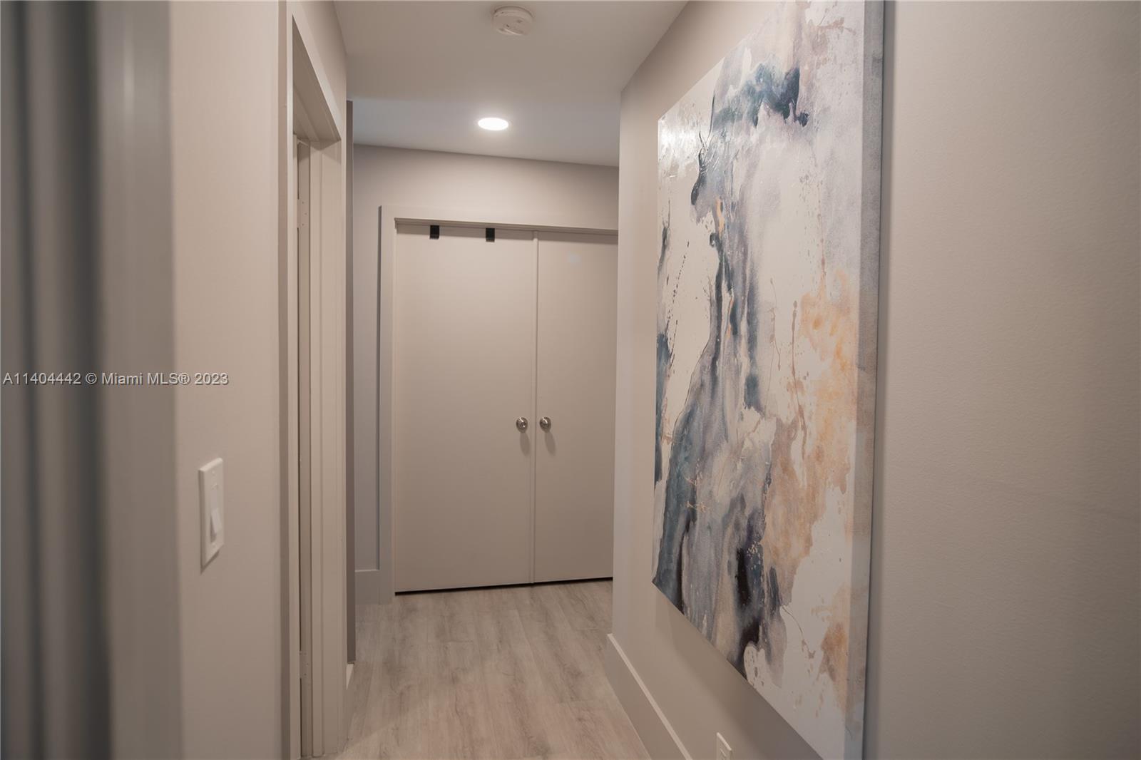 10684 Santa Laguna Drive Boca Raton, FL 33428 - Photo 16 of 39 a view of a bathroom from the hallway