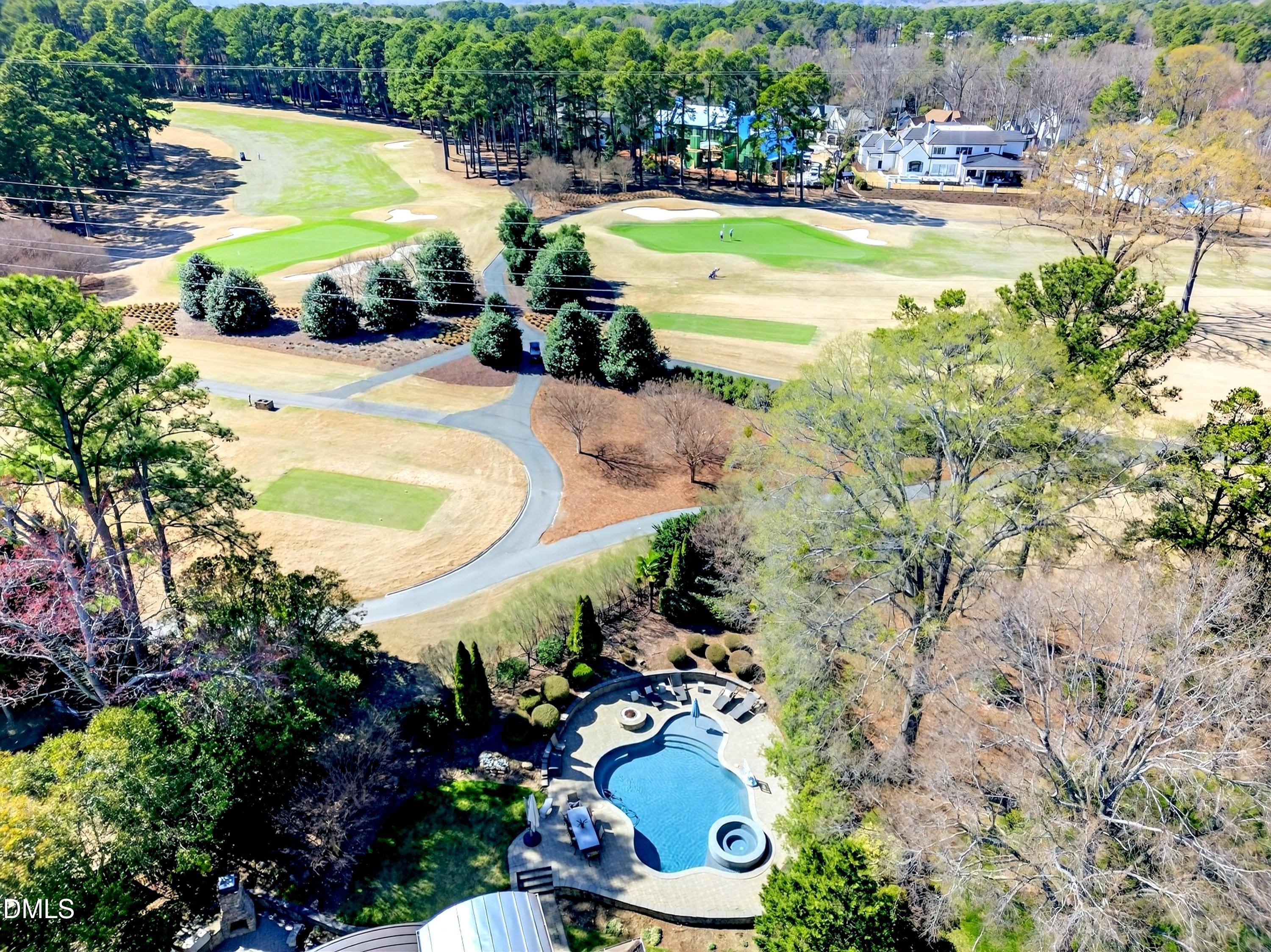 6701 Foxfire Place Raleigh, NC 27615 - Photo 58 of 67 an aerial view of a swimming pool and lounge chair