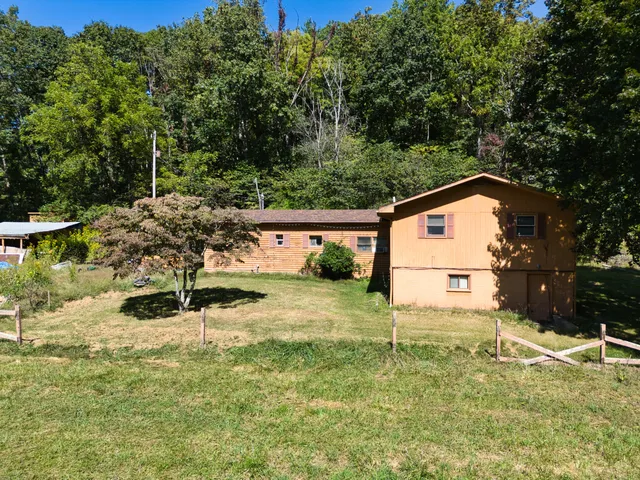 a view of a garden with an outdoor space