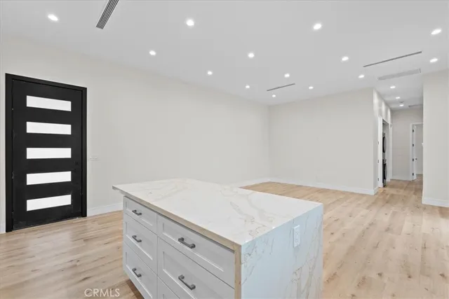 a view of a hallway with washer and dryer