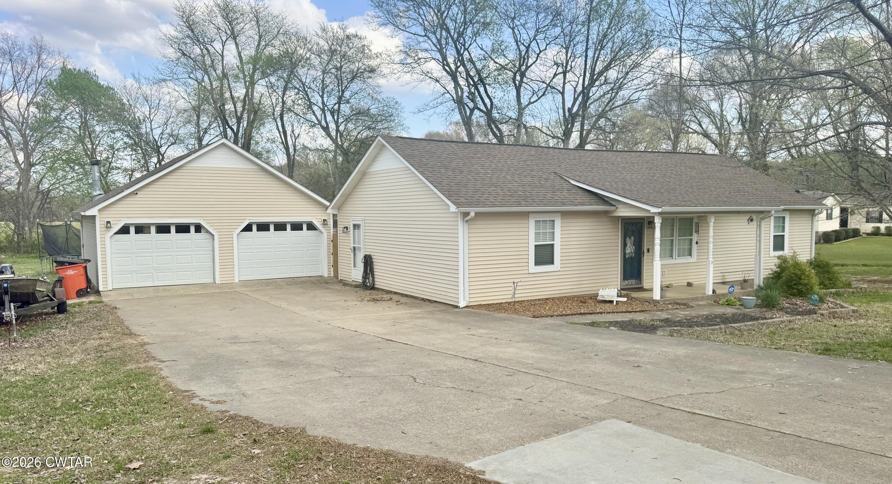 235 Tate Road Dyersburg, TN 38024 - Photo 1 of 34 a view of house with outdoor space and parking