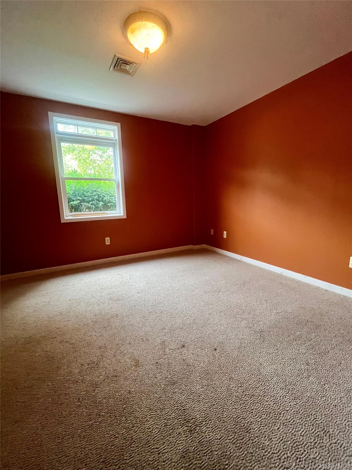 769 Bullville Road Montgomery, NY 12549 - Photo 12 of 19 an empty room with windows
