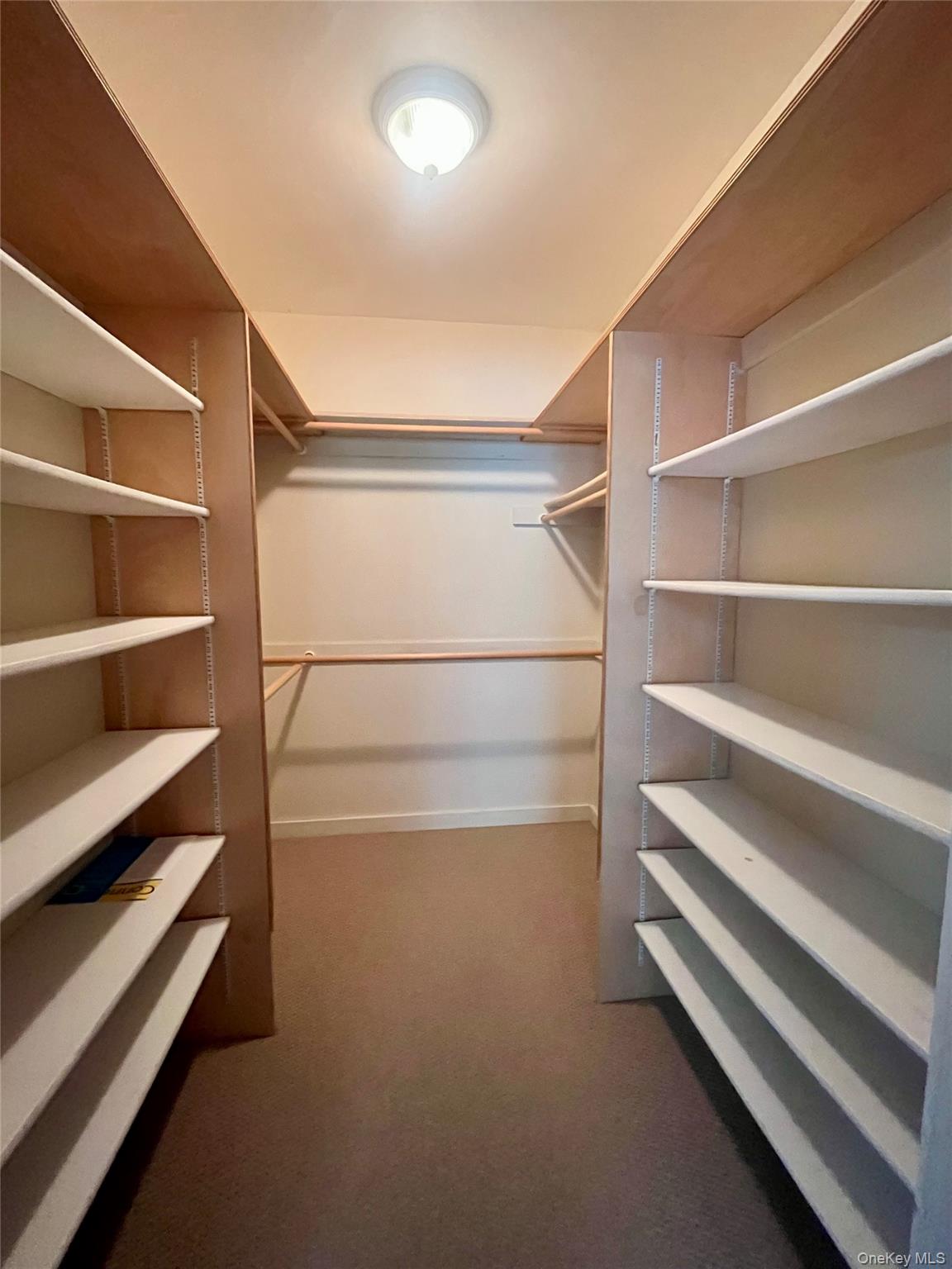 769 Bullville Road Montgomery, NY 12549 - Photo 14 of 19 a view of walk in closet with empty racks