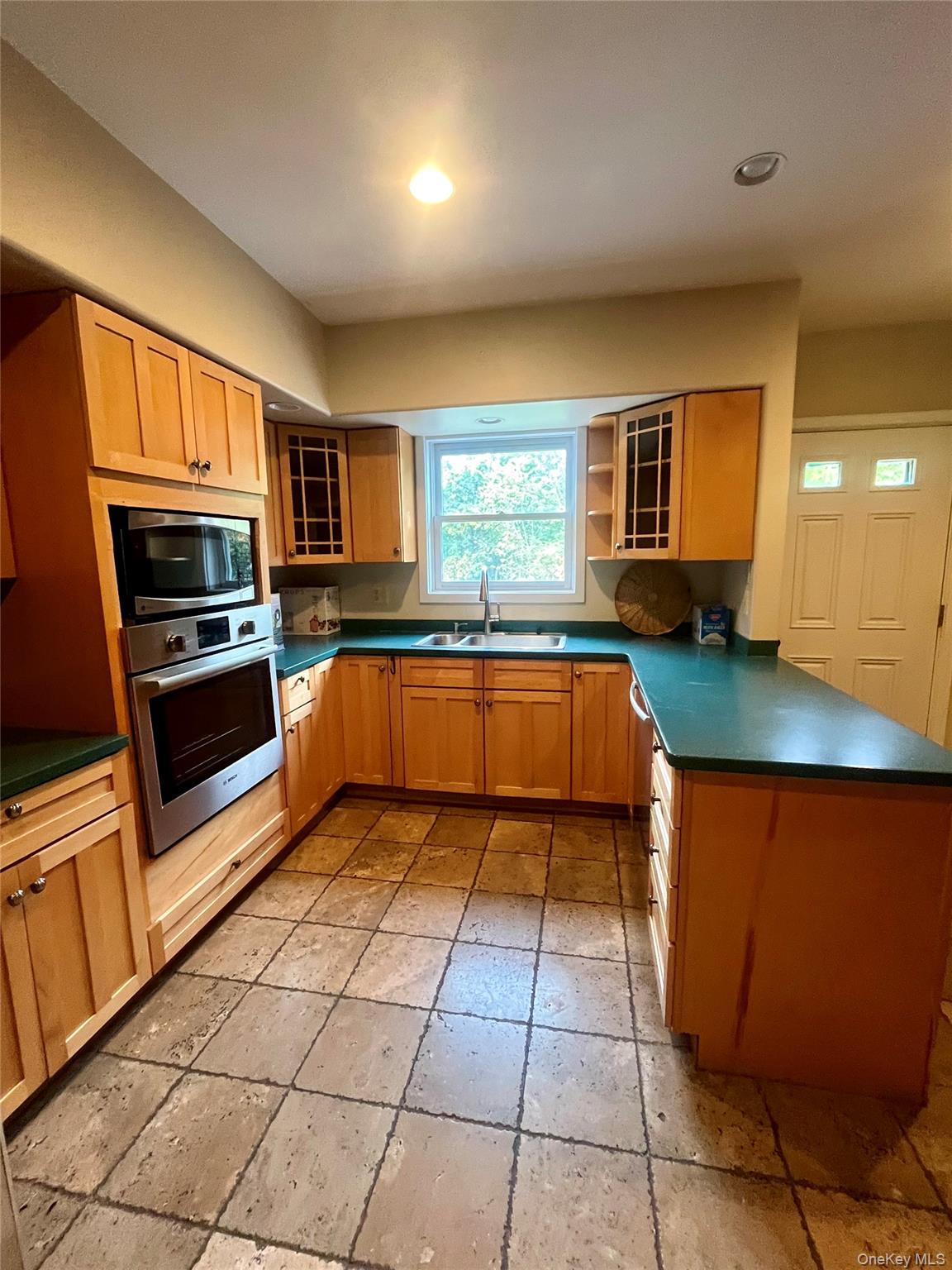 769 Bullville Road Montgomery, NY 12549 - Photo 6 of 19 a kitchen with stainless steel appliances granite countertop a stove a sink and a microwave