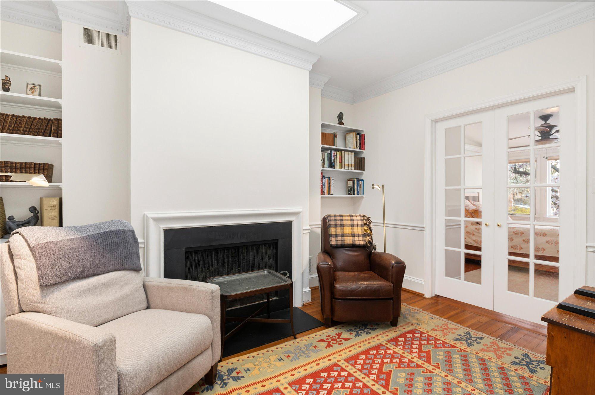 512 Independence Avenue Southeast Washington, DC 20003 - Photo 13 of 28 Primary suite : fireplace, built-ins, skylights