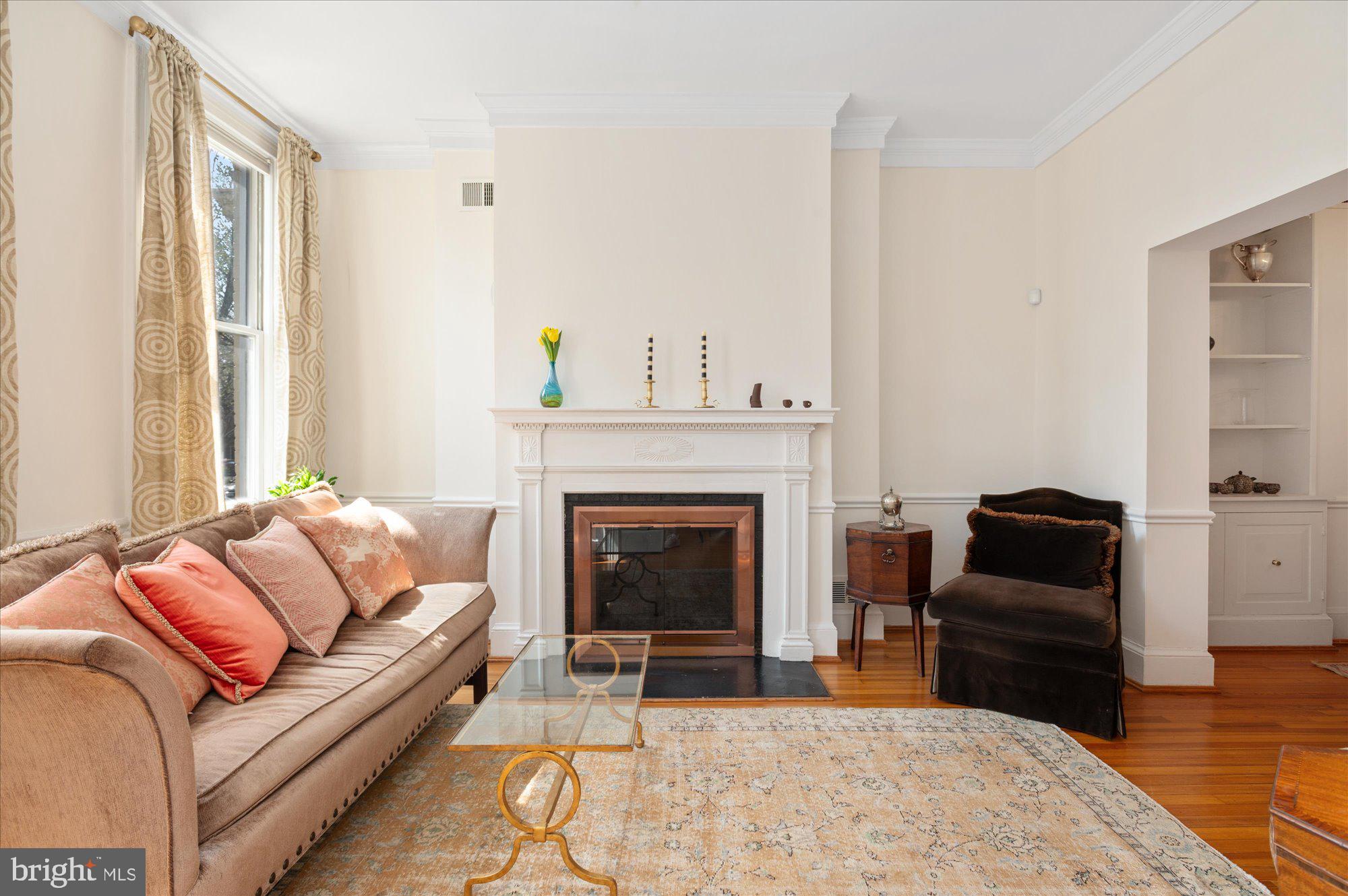 512 Independence Avenue Southeast Washington, DC 20003 - Photo 6 of 28 Living room w/wood burning fireplace