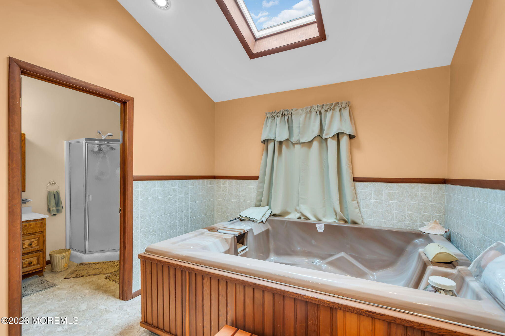 203 Freehold Road Jackson, NJ 08527 - Photo 19 of 33 a bathroom with a sink and a mirror