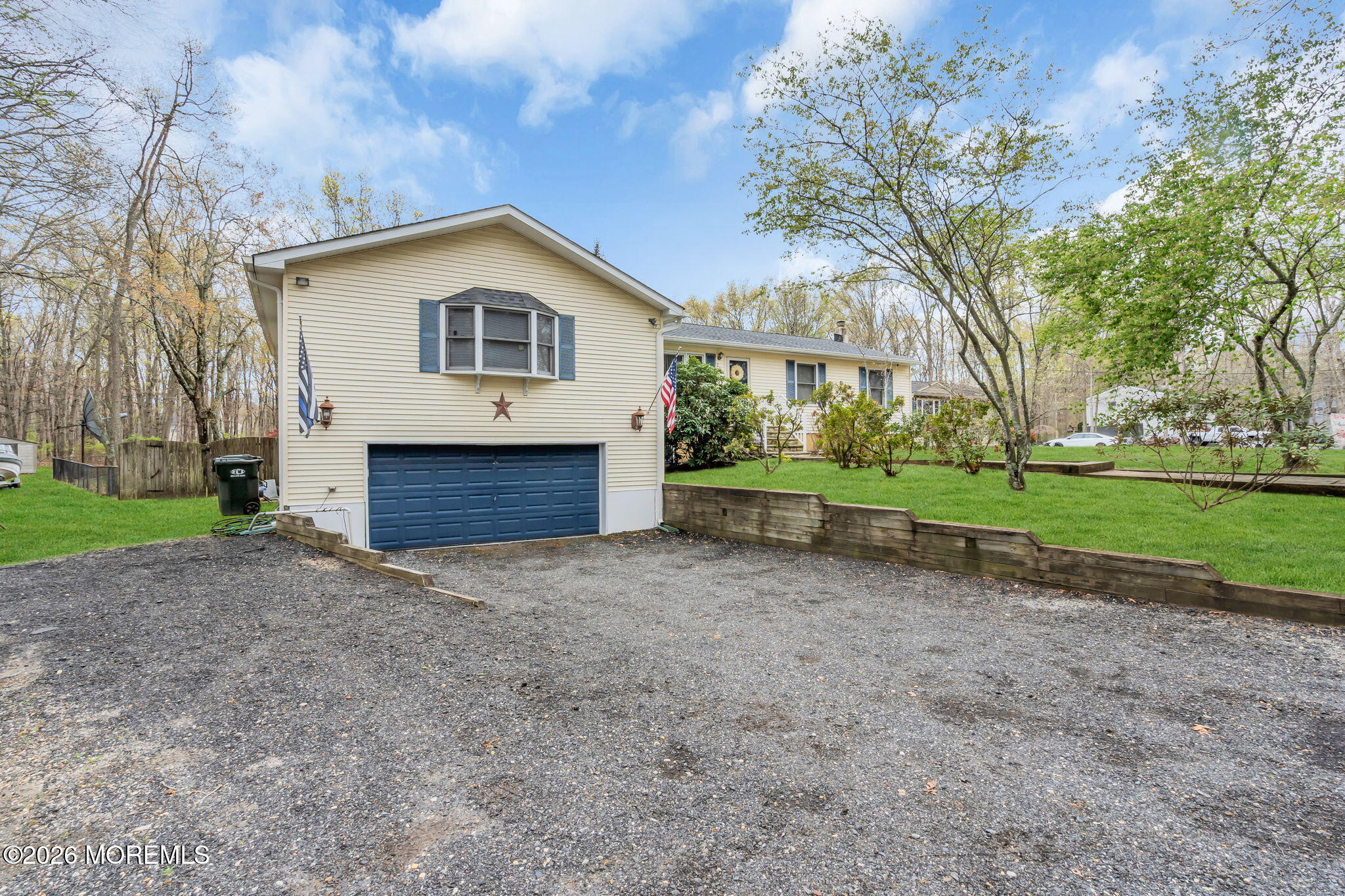 203 Freehold Road Jackson, NJ 08527 - Photo 24 of 33 a front view of a house with a yard and garage
