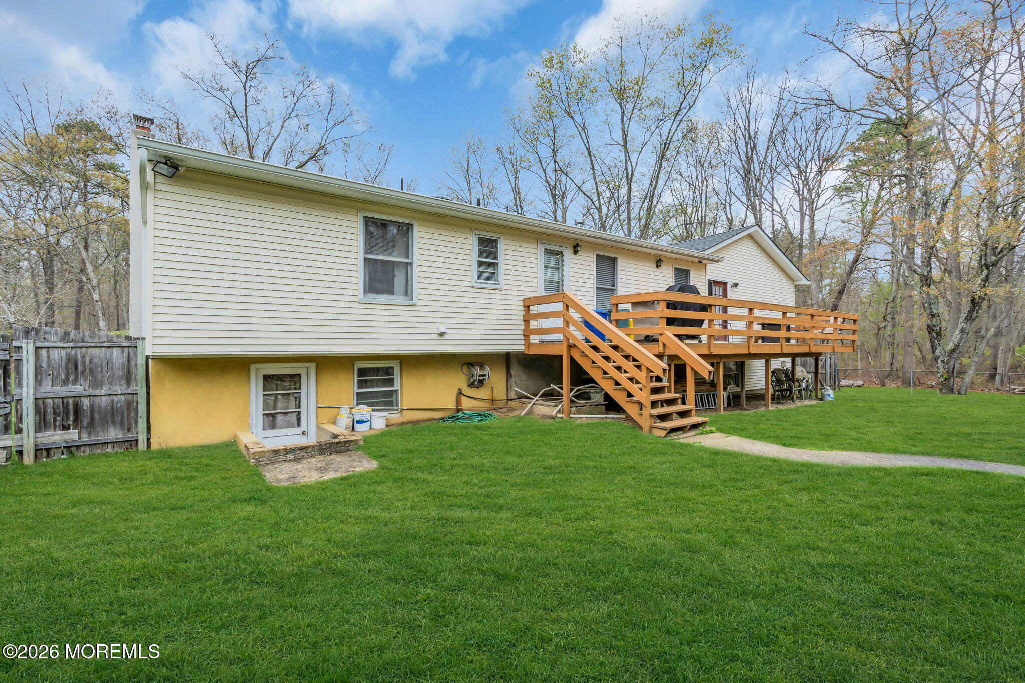 203 Freehold Road Jackson, NJ 08527 - Photo 25 of 33 a front view of house with yard and outdoor seating