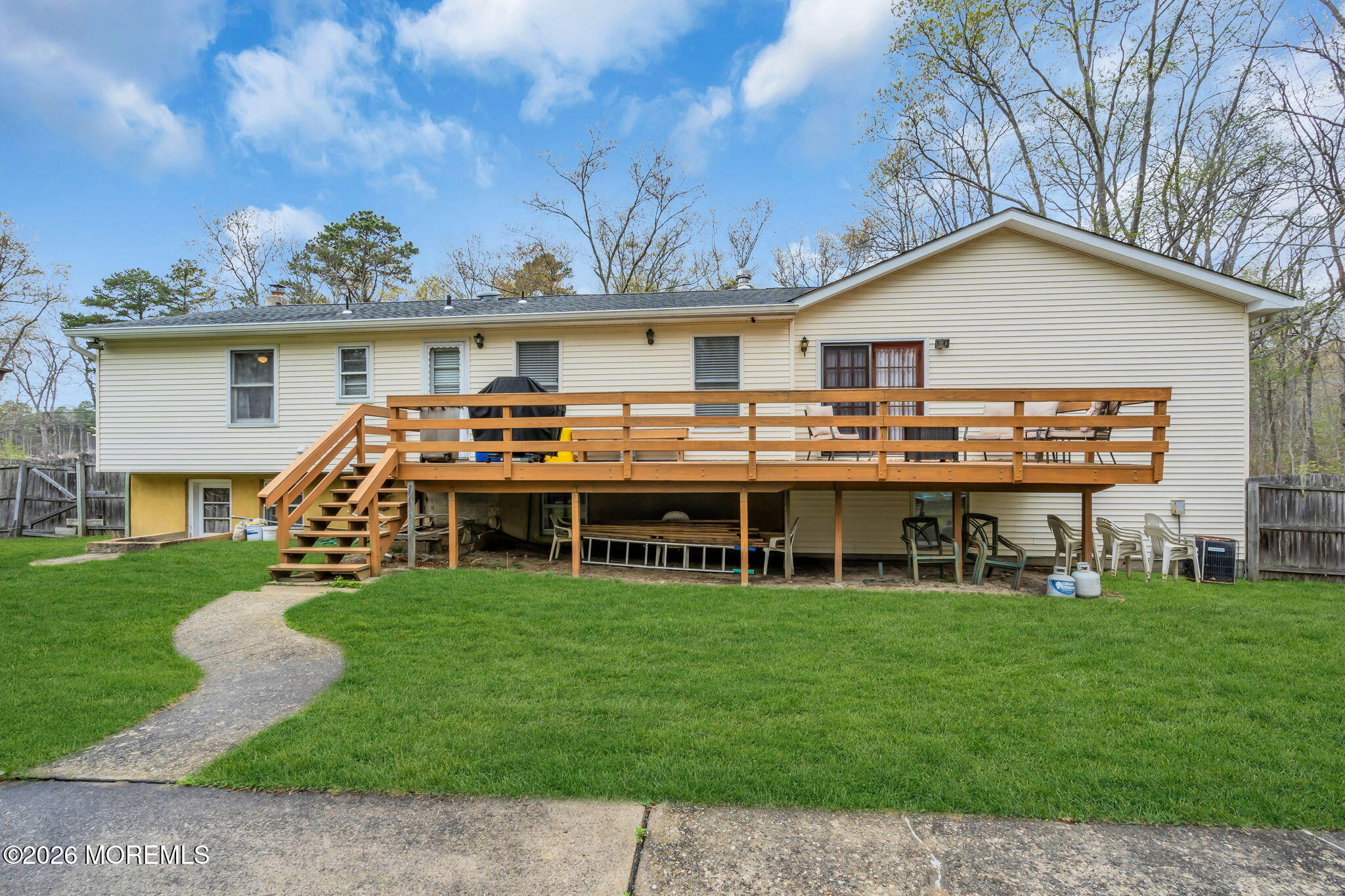203 Freehold Road Jackson, NJ 08527 - Photo 26 of 33 a view of a house with a yard and sitting area