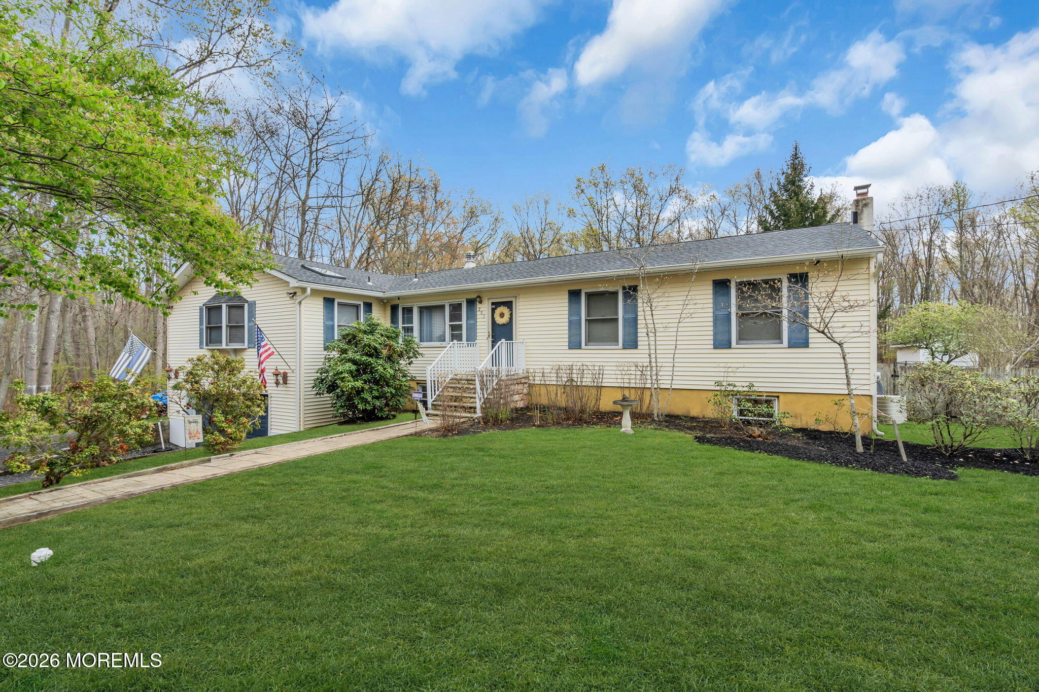 203 Freehold Road Jackson, NJ 08527 - Photo 3 of 33 a front view of a house with garden
