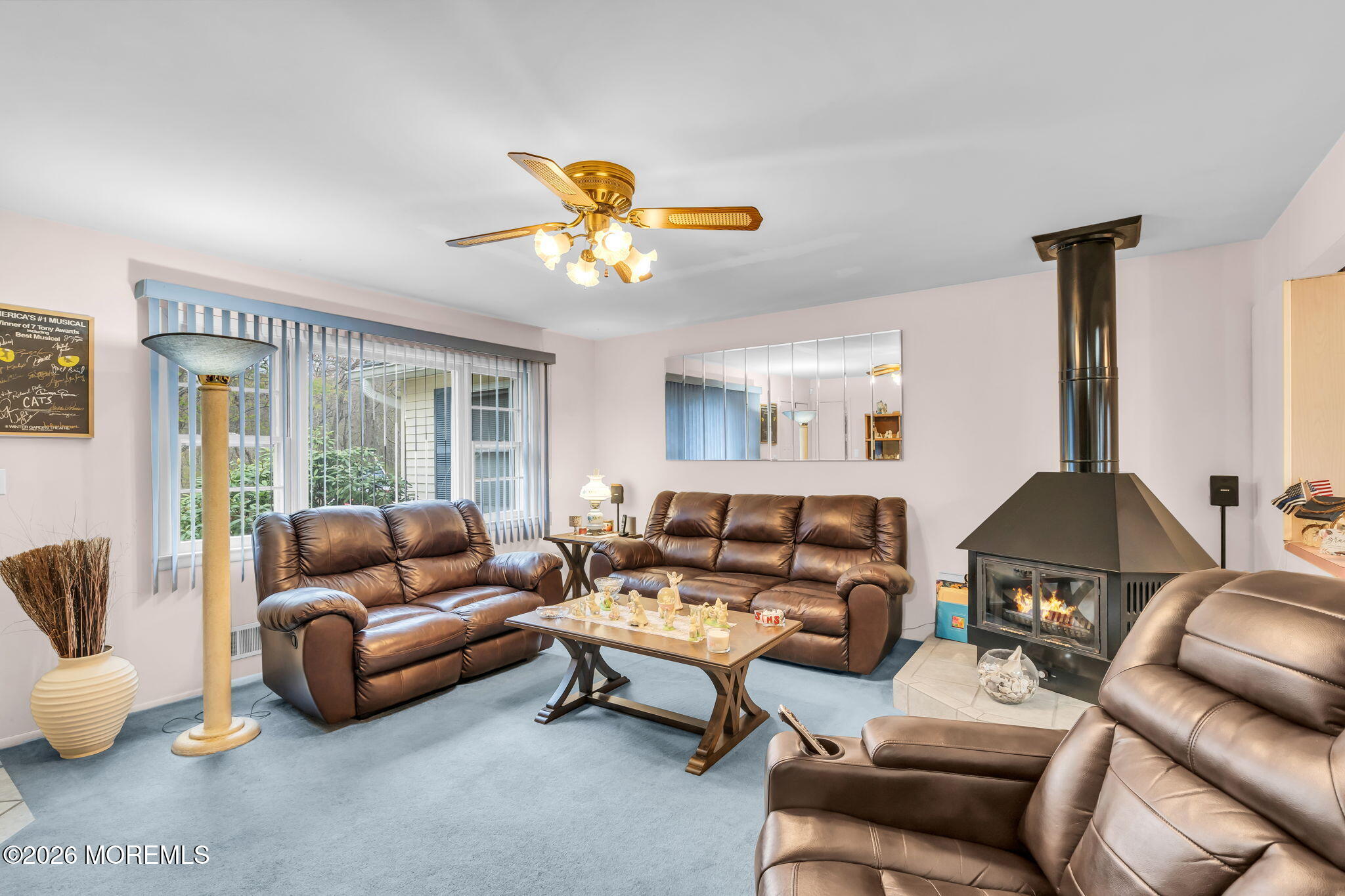 203 Freehold Road Jackson, NJ 08527 - Photo 5 of 33 a living room with furniture and a large window