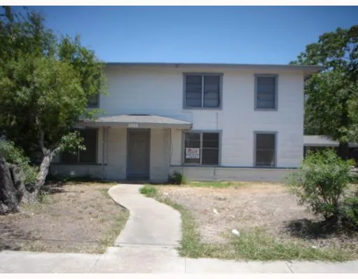 a view of a house with a patio