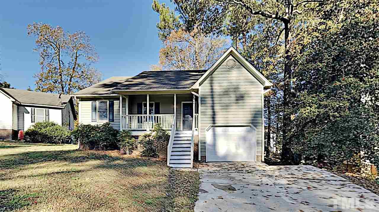 4104 Old Coach Road Raleigh, NC 27616 - Photo 1 of 9 a view of a house with a yard