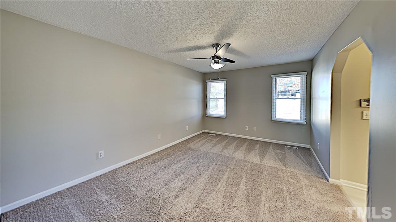4104 Old Coach Road Raleigh, NC 27616 - Photo 4 of 9 a view of an empty room with a window