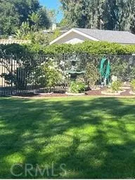 a view of a garden with a lake