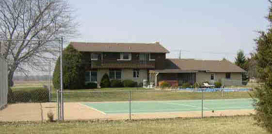 344 Gleasman Road Roscoe, IL 61073 - Photo 4 of 4 a view of house with a swimming pool