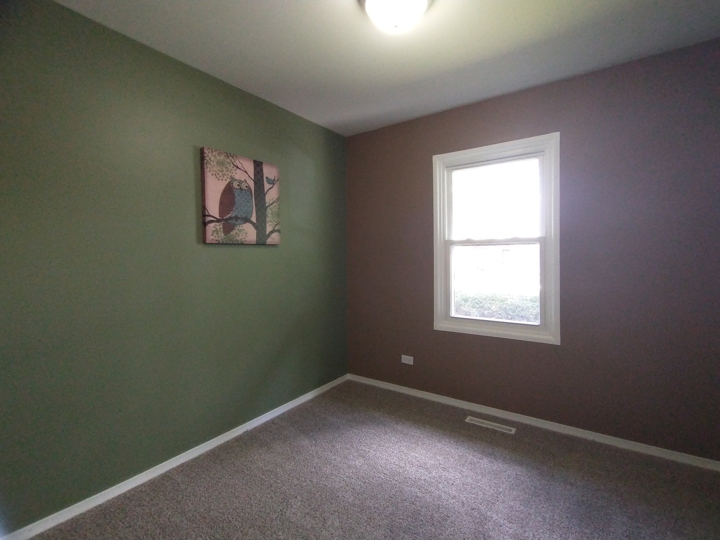 3438 Carpenter Street Steger, IL 60475 - Photo 8 of 10 an empty room with a window