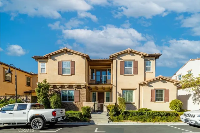 a view of a car parked in front of a house