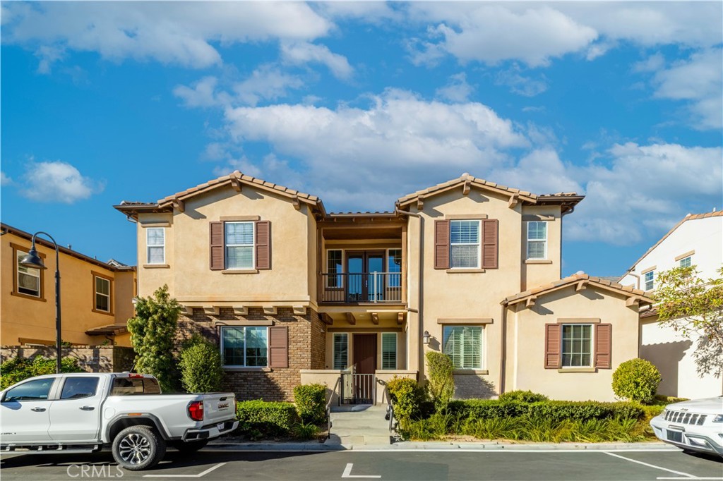 a view of a car parked in front of a house