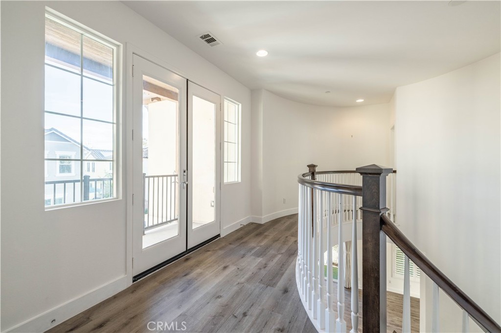 4 Lavanda Street Rancho Mission Viejo, CA 92694 - Photo 18 of 43 a view of entryway with wooden floor and balcony