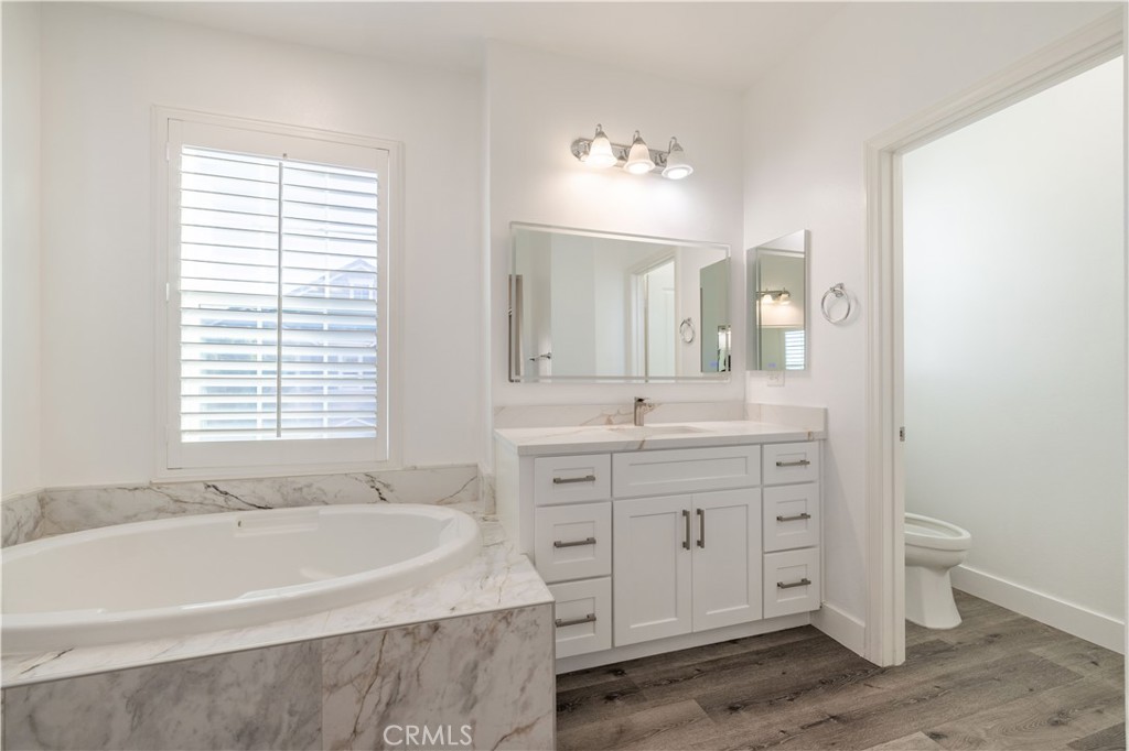4 Lavanda Street Rancho Mission Viejo, CA 92694 - Photo 25 of 43 a spacious bathroom with a tub sink and mirror