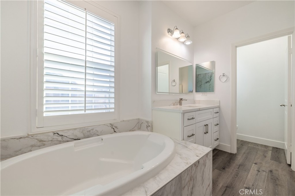 4 Lavanda Street Rancho Mission Viejo, CA 92694 - Photo 27 of 43 a bathroom with a tub sink and mirror